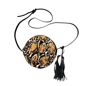 Patricia Nash Scafati Circle Crossbody Bag in a python print on calf hair.